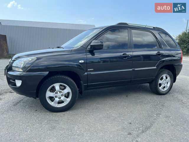 Черный Киа Sportage, объемом двигателя 2 л и пробегом 150 тыс. км за 10000 $, фото 3 на Automoto.ua