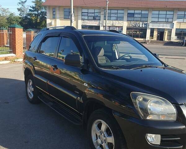 Чорний Кіа Sportage, об'ємом двигуна 2 л та пробігом 290 тис. км за 8200 $, фото 7 на Automoto.ua