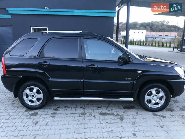 Черный Киа Sportage, объемом двигателя 2 л и пробегом 290 тыс. км за 7200 $, фото 12 на Automoto.ua