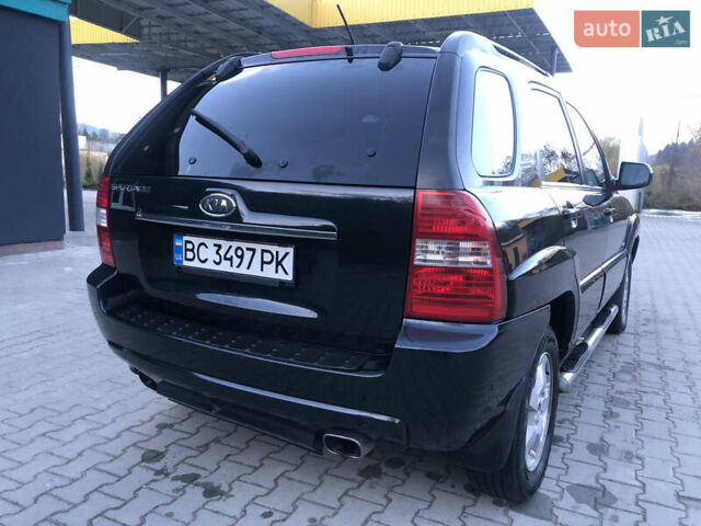 Черный Киа Sportage, объемом двигателя 2 л и пробегом 290 тыс. км за 7200 $, фото 10 на Automoto.ua