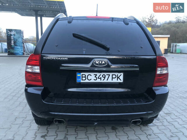 Черный Киа Sportage, объемом двигателя 2 л и пробегом 290 тыс. км за 7200 $, фото 9 на Automoto.ua