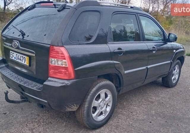Черный Киа Sportage, объемом двигателя 2 л и пробегом 275 тыс. км за 7600 $, фото 9 на Automoto.ua