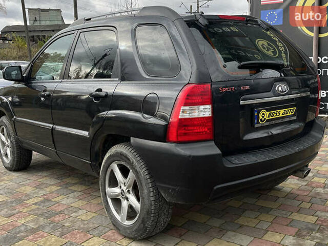 Черный Киа Sportage, объемом двигателя 1.98 л и пробегом 293 тыс. км за 6600 $, фото 4 на Automoto.ua