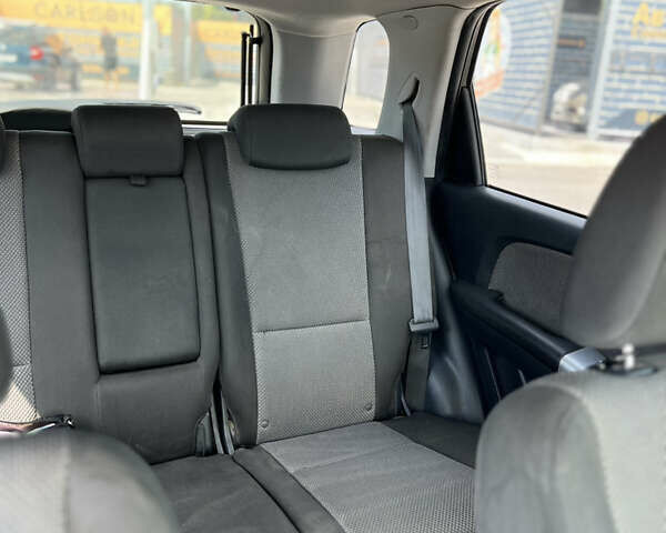 Черный Киа Sportage, объемом двигателя 2 л и пробегом 150 тыс. км за 10000 $, фото 8 на Automoto.ua