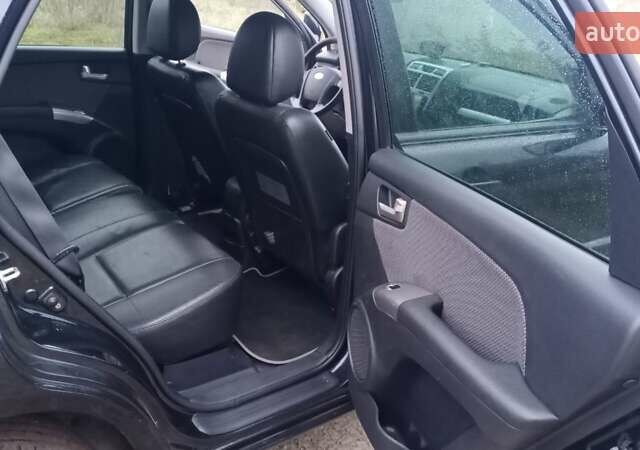 Черный Киа Sportage, объемом двигателя 2 л и пробегом 275 тыс. км за 7600 $, фото 15 на Automoto.ua
