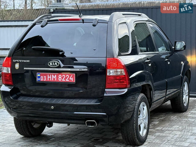 Чорний Кіа Sportage, об'ємом двигуна 2 л та пробігом 215 тис. км за 8600 $, фото 26 на Automoto.ua