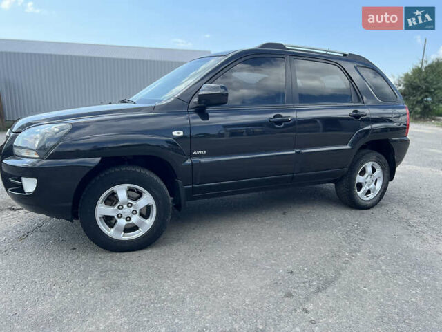 Черный Киа Sportage, объемом двигателя 2 л и пробегом 150 тыс. км за 10000 $, фото 2 на Automoto.ua