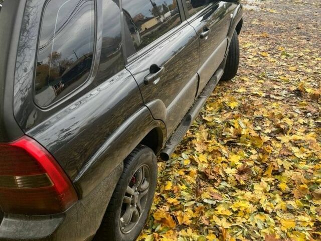 Чорний Кіа Sportage, об'ємом двигуна 2 л та пробігом 301 тис. км за 7300 $, фото 2 на Automoto.ua