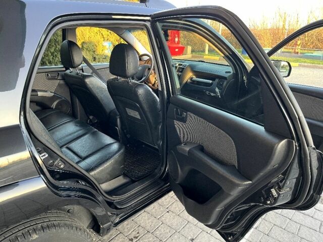 Черный Киа Sportage, объемом двигателя 2 л и пробегом 226 тыс. км за 8800 $, фото 5 на Automoto.ua