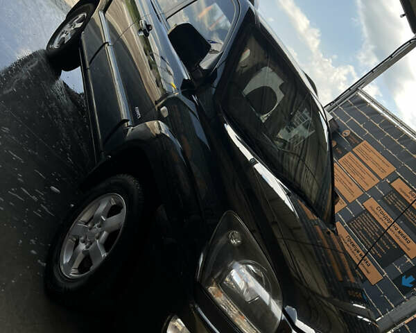 Черный Киа Sportage, объемом двигателя 2 л и пробегом 150 тыс. км за 10000 $, фото 4 на Automoto.ua