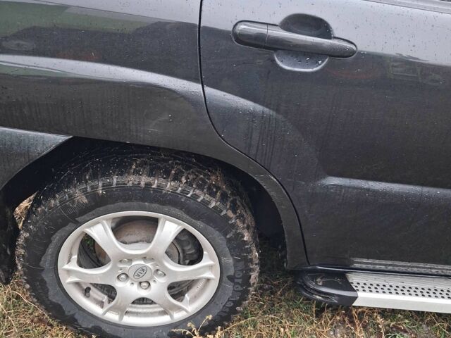 Черный Киа Sportage, объемом двигателя 2 л и пробегом 167 тыс. км за 9000 $, фото 11 на Automoto.ua