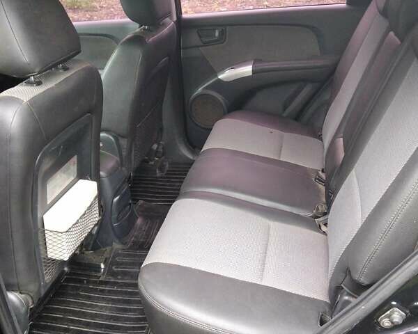 Чорний Кіа Sportage, об'ємом двигуна 2 л та пробігом 248 тис. км за 8600 $, фото 5 на Automoto.ua