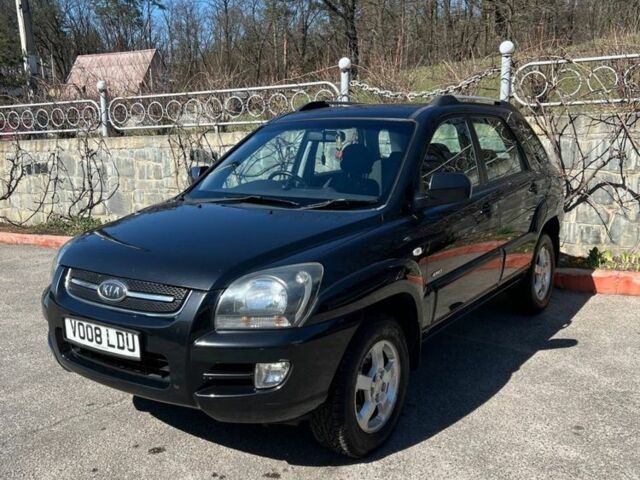 Черный Киа Sportage, объемом двигателя 2 л и пробегом 196 тыс. км за 6000 $, фото 1 на Automoto.ua