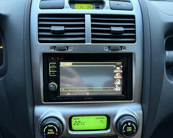 Чорний Кіа Sportage, об'ємом двигуна 2 л та пробігом 215 тис. км за 8600 $, фото 42 на Automoto.ua