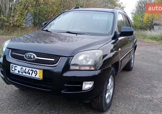 Черный Киа Sportage, объемом двигателя 2 л и пробегом 275 тыс. км за 7600 $, фото 10 на Automoto.ua