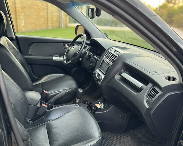 Черный Киа Sportage, объемом двигателя 2 л и пробегом 257 тыс. км за 10300 $, фото 32 на Automoto.ua