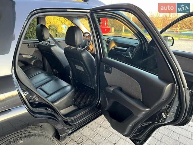 Черный Киа Sportage, объемом двигателя 2 л и пробегом 226 тыс. км за 8800 $, фото 3 на Automoto.ua