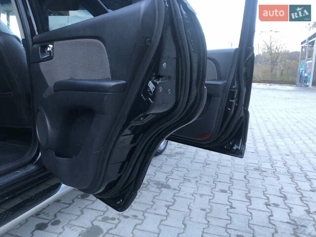 Черный Киа Sportage, объемом двигателя 2 л и пробегом 290 тыс. км за 7200 $, фото 15 на Automoto.ua