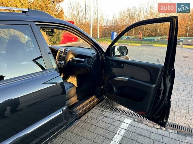 Черный Киа Sportage, объемом двигателя 2 л и пробегом 226 тыс. км за 8800 $, фото 8 на Automoto.ua