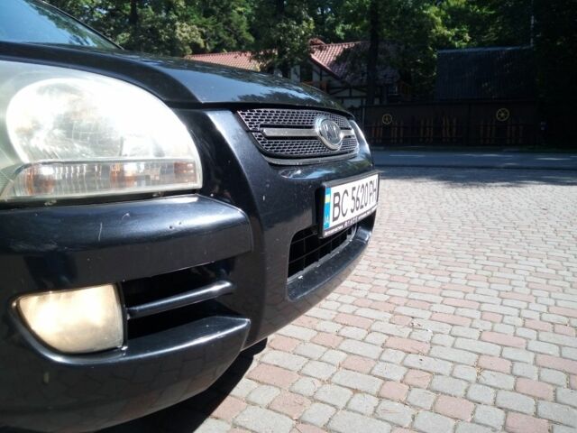 Черный Киа Sportage, объемом двигателя 2 л и пробегом 290 тыс. км за 5998 $, фото 11 на Automoto.ua