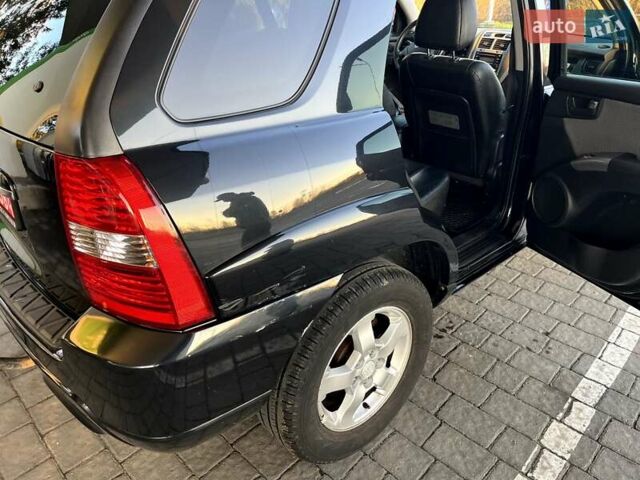 Черный Киа Sportage, объемом двигателя 2 л и пробегом 226 тыс. км за 8800 $, фото 5 на Automoto.ua