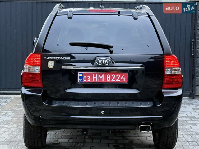 Чорний Кіа Sportage, об'ємом двигуна 2 л та пробігом 215 тис. км за 8600 $, фото 25 на Automoto.ua