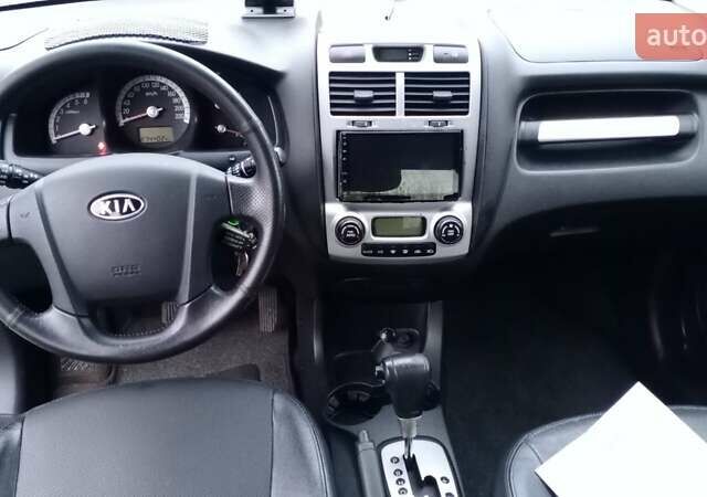 Черный Киа Sportage, объемом двигателя 2 л и пробегом 275 тыс. км за 7600 $, фото 1 на Automoto.ua