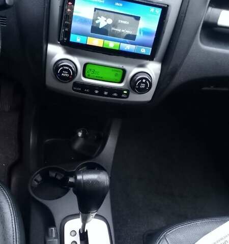 Черный Киа Sportage, объемом двигателя 2 л и пробегом 275 тыс. км за 7600 $, фото 11 на Automoto.ua