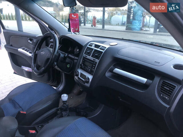 Черный Киа Sportage, объемом двигателя 2 л и пробегом 290 тыс. км за 7200 $, фото 17 на Automoto.ua