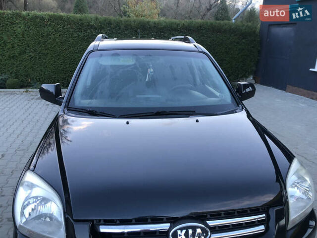 Черный Киа Sportage, объемом двигателя 2 л и пробегом 290 тыс. км за 7200 $, фото 4 на Automoto.ua