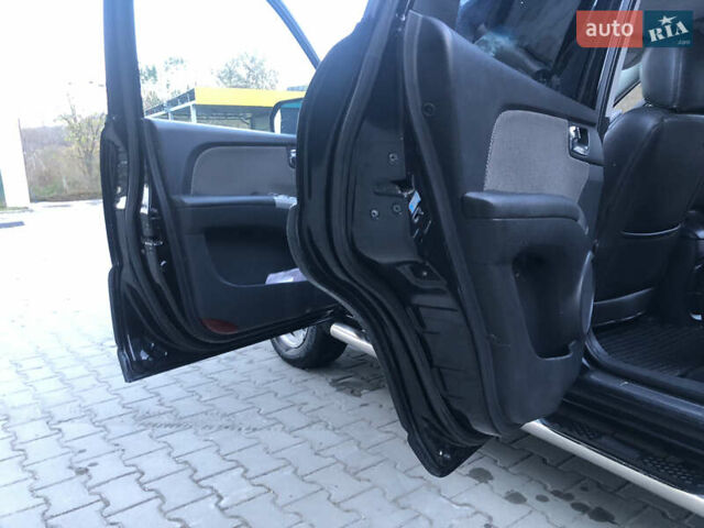Черный Киа Sportage, объемом двигателя 2 л и пробегом 290 тыс. км за 7200 $, фото 14 на Automoto.ua