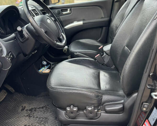 Черный Киа Sportage, объемом двигателя 2 л и пробегом 257 тыс. км за 10300 $, фото 35 на Automoto.ua