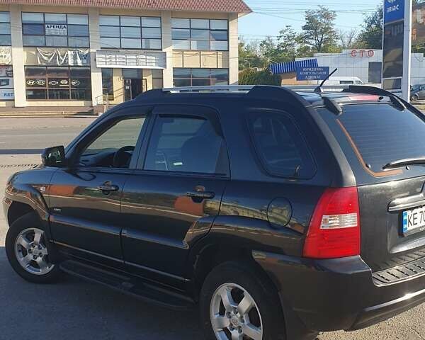 Чорний Кіа Sportage, об'ємом двигуна 2 л та пробігом 290 тис. км за 8200 $, фото 12 на Automoto.ua