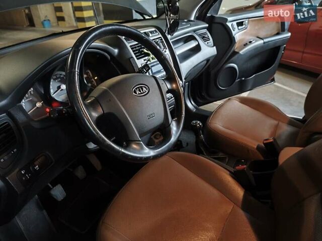 Кіа Sportage 2008 у Львові на Automoto.ua Чорний Кіа Sportage, об'ємом двигуна 1.98 л та пробігом 186 тис. км за 8200 $, фото 4 на Automoto.ua