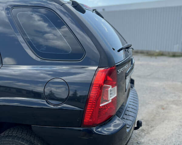 Черный Киа Sportage, объемом двигателя 2 л и пробегом 150 тыс. км за 10000 $, фото 14 на Automoto.ua