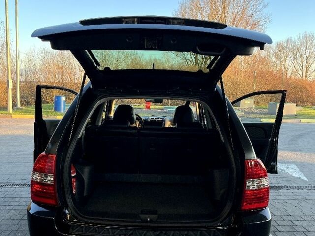 Черный Киа Sportage, объемом двигателя 2 л и пробегом 226 тыс. км за 8800 $, фото 7 на Automoto.ua