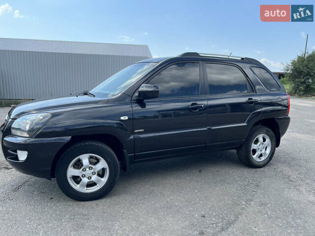 Черный Киа Sportage, объемом двигателя 2 л и пробегом 150 тыс. км за 10000 $, фото 11 на Automoto.ua