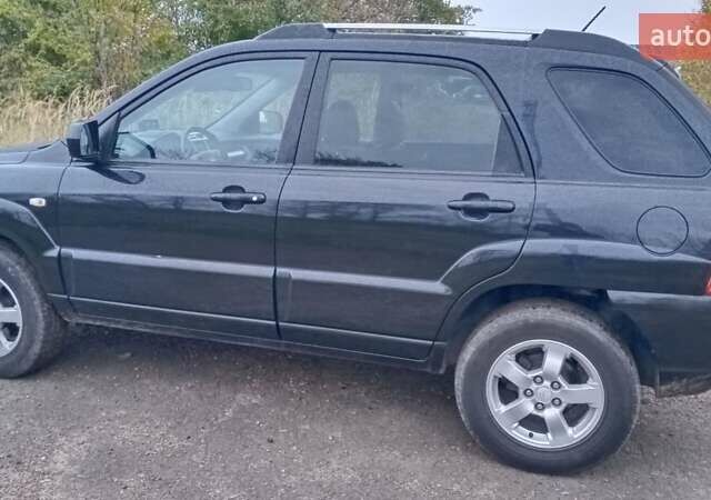 Черный Киа Sportage, объемом двигателя 2 л и пробегом 275 тыс. км за 7600 $, фото 5 на Automoto.ua
