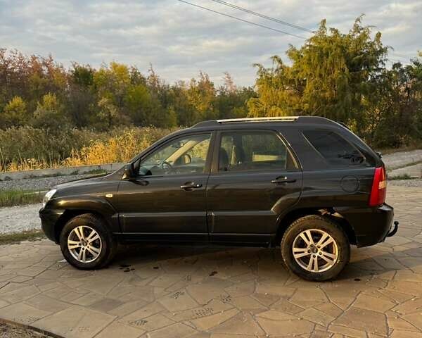 Чорний Кіа Sportage, об'ємом двигуна 1.99 л та пробігом 257 тис. км за 8500 $, фото 3 на Automoto.ua