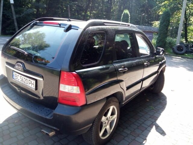 Черный Киа Sportage, объемом двигателя 2 л и пробегом 290 тыс. км за 5998 $, фото 6 на Automoto.ua