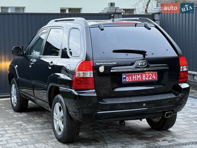 Чорний Кіа Sportage, об'ємом двигуна 2 л та пробігом 215 тис. км за 8600 $, фото 27 на Automoto.ua