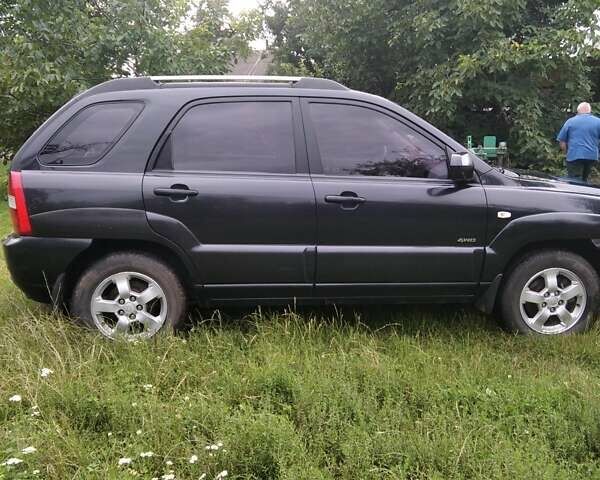 Чорний Кіа Sportage, об'ємом двигуна 2 л та пробігом 248 тис. км за 8600 $, фото 4 на Automoto.ua