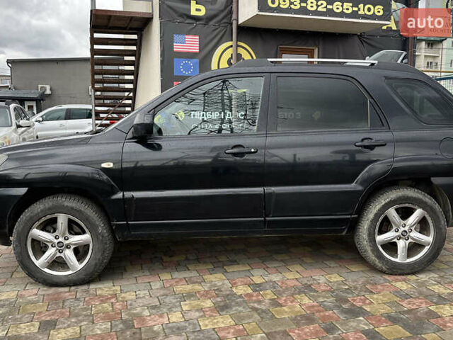 Черный Киа Sportage, объемом двигателя 1.98 л и пробегом 293 тыс. км за 6600 $, фото 3 на Automoto.ua