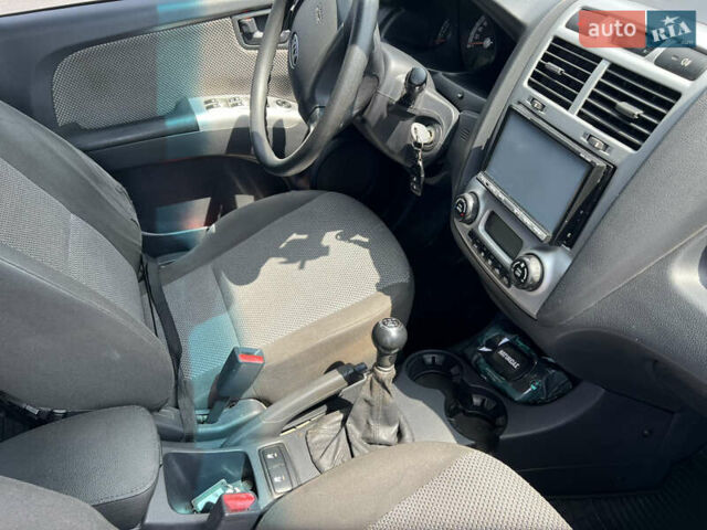 Черный Киа Sportage, объемом двигателя 2 л и пробегом 150 тыс. км за 10000 $, фото 6 на Automoto.ua