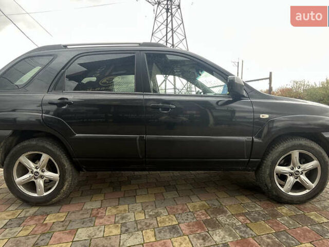 Черный Киа Sportage, объемом двигателя 1.98 л и пробегом 293 тыс. км за 6600 $, фото 7 на Automoto.ua