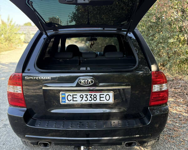 Чорний Кіа Sportage, об'ємом двигуна 1.99 л та пробігом 200 тис. км за 8500 $, фото 9 на Automoto.ua