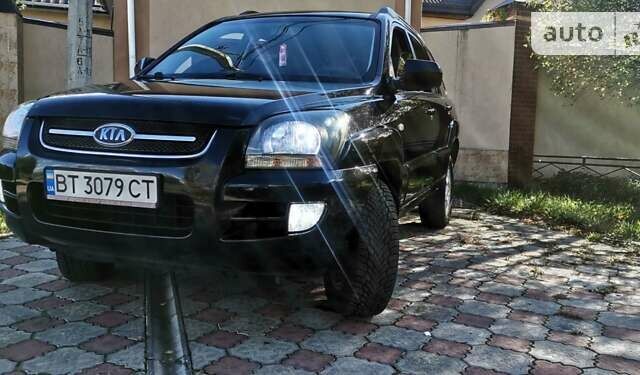 Черный Киа Sportage, объемом двигателя 1.98 л и пробегом 156 тыс. км за 9800 $, фото 2 на Automoto.ua