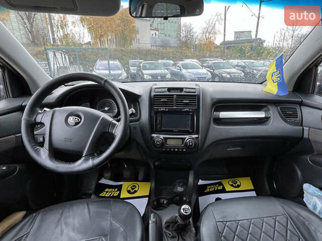 Черный Киа Sportage, объемом двигателя 1.98 л и пробегом 293 тыс. км за 6600 $, фото 8 на Automoto.ua