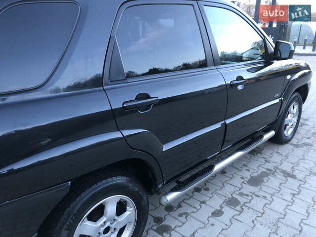 Черный Киа Sportage, объемом двигателя 2 л и пробегом 290 тыс. км за 7200 $, фото 11 на Automoto.ua