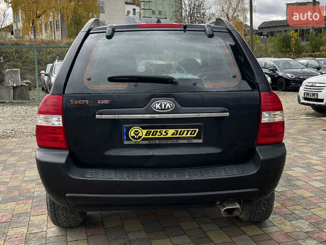 Черный Киа Sportage, объемом двигателя 1.98 л и пробегом 293 тыс. км за 6600 $, фото 5 на Automoto.ua